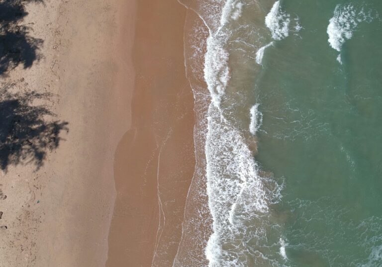 Aerial view of Hua Hin beach in Thailand with clear waters and sandy shoreline