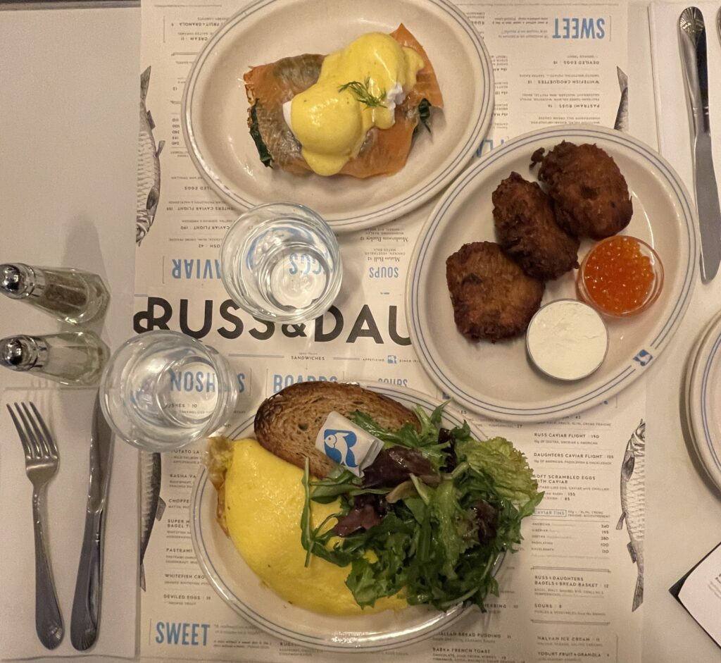 Two plates of classic breakfast dishes from Russ & Daughters in New York City’s Lower East Side.