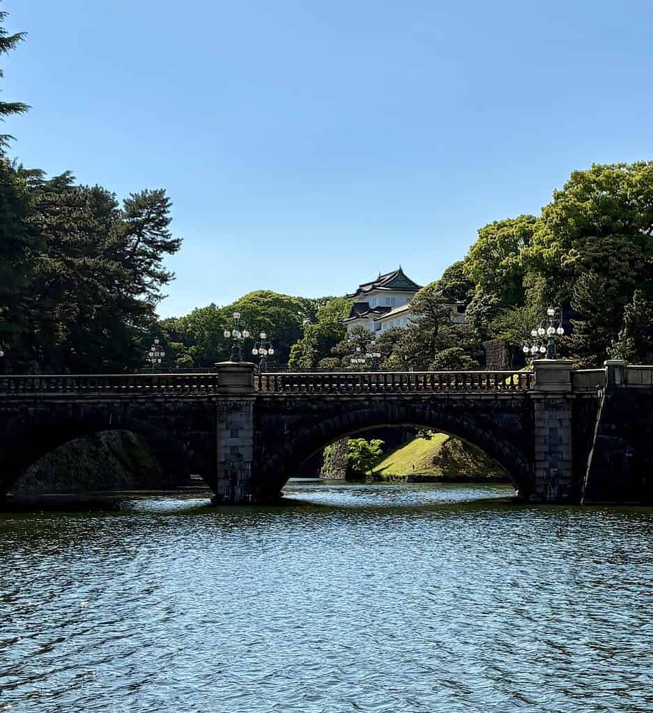 Imperial Palace in Tokyo with stone bridge and water on a sunny day
