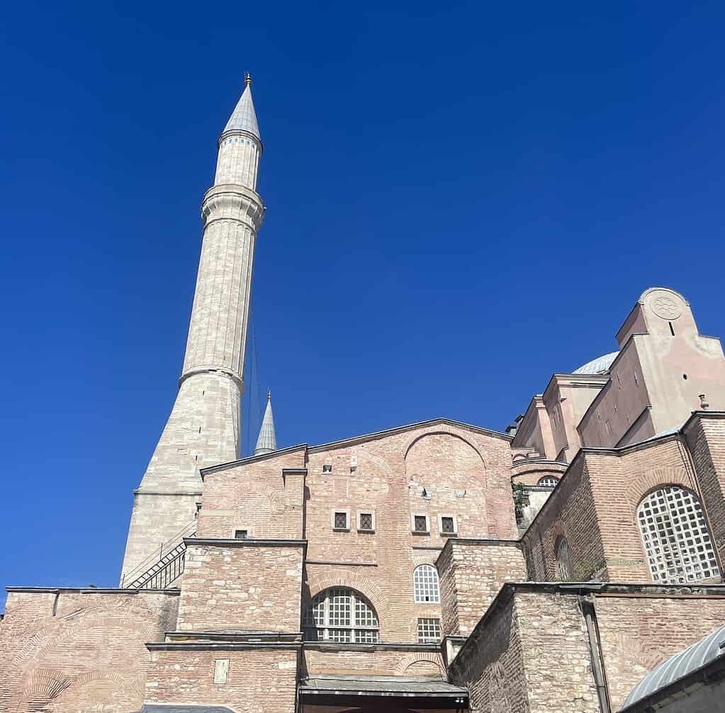 Side view of the exterior of the Hagia Sophia mosque in Istanbul on a clear day.